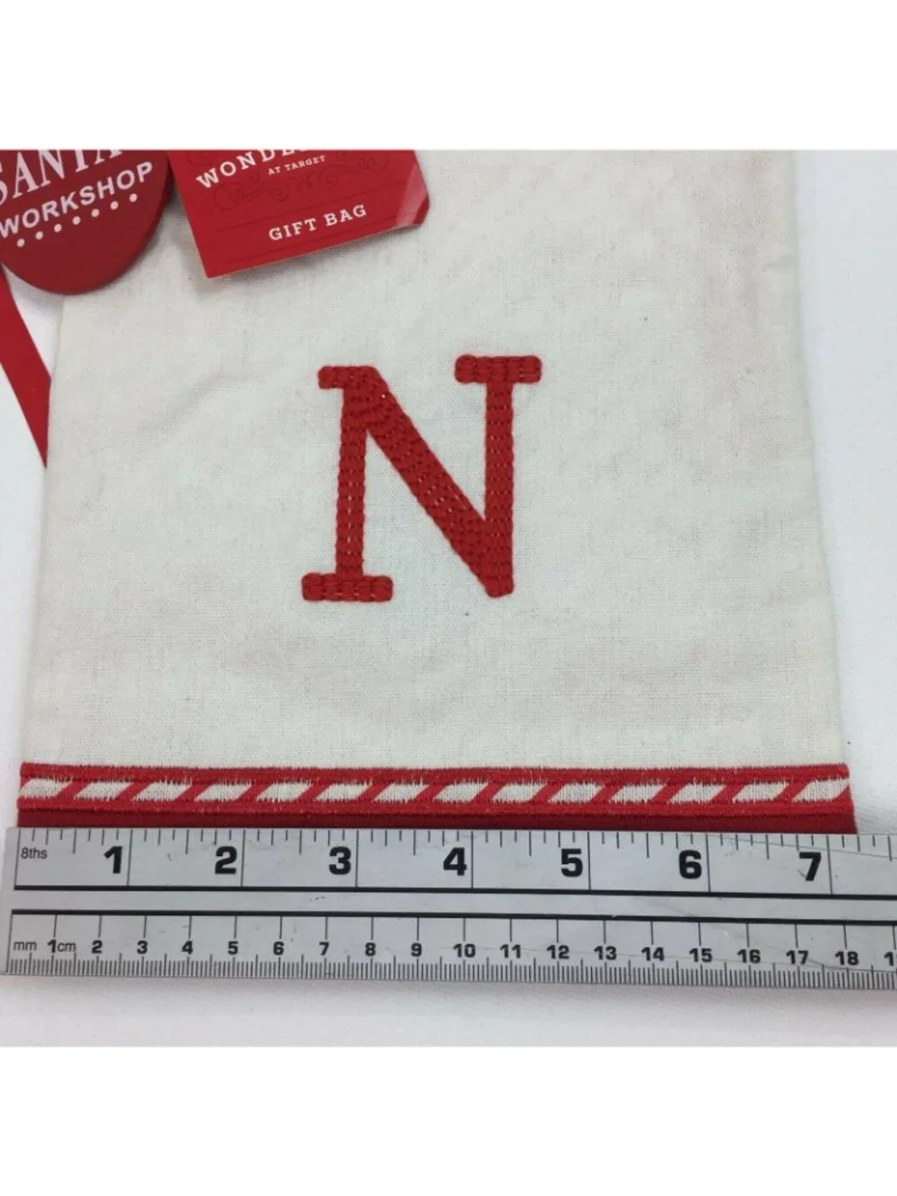 Wondershop White Monogram Red Initial N Drawstring Gift Bag Santas Workshop Bell